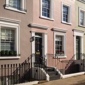 side-view-front-doors-with-brown-orange-wall-min